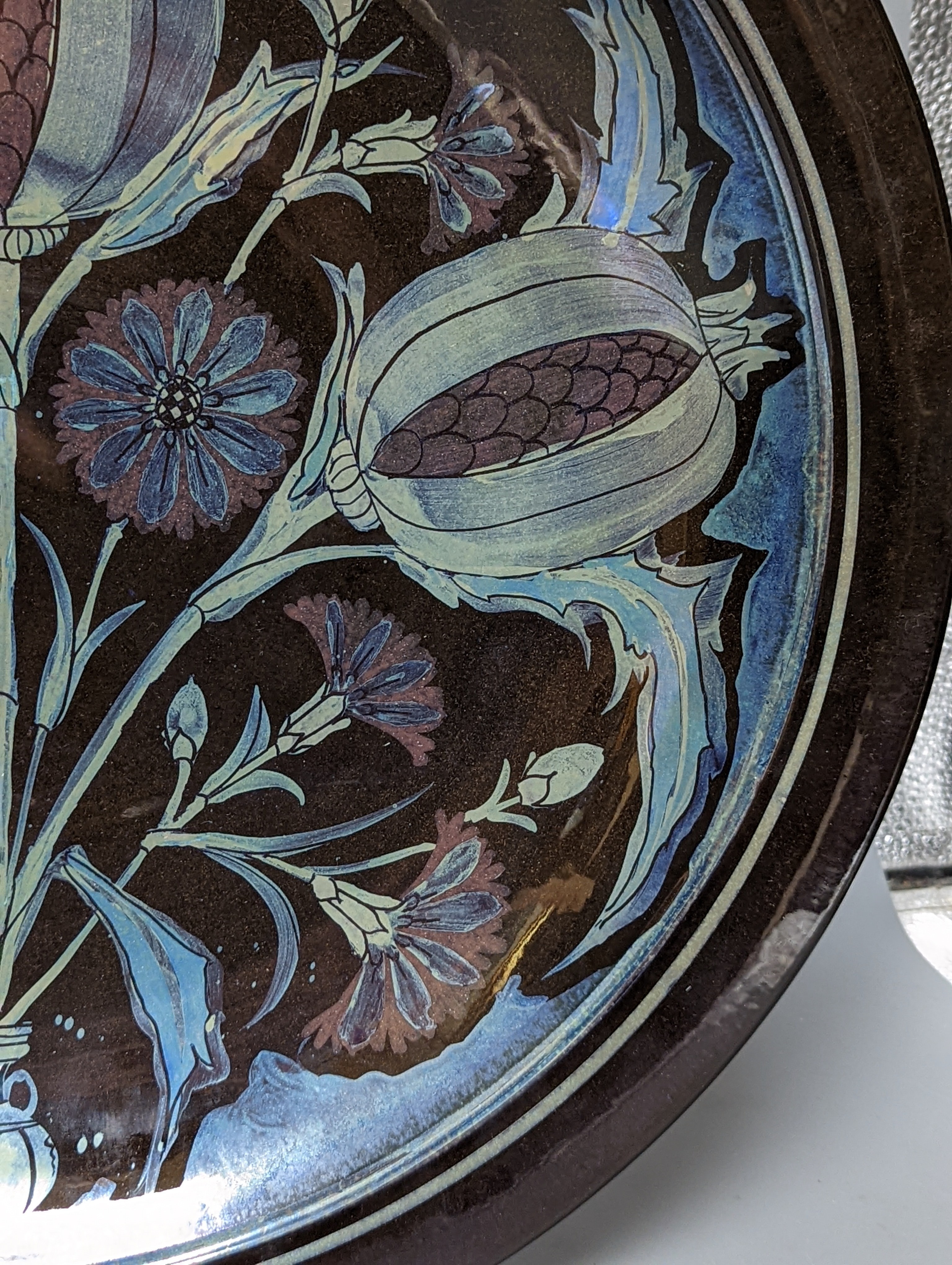 Jonathan Chiswell-Jones. A pomegranate pattern reduction fired lustre charger, numbered 4232, diameter 44cm